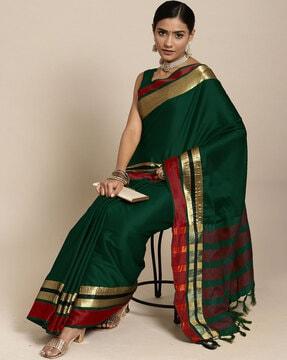 woven saree with contrast border & tassels