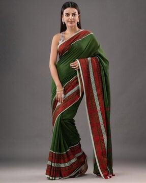 woven saree with contrast border & tassels