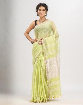 woven saree with tassels border