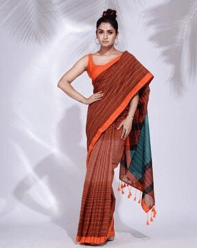 woven saree with tassels