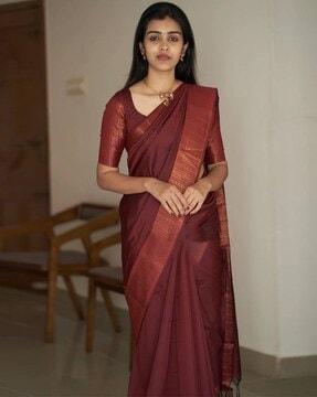 woven saree with tassels