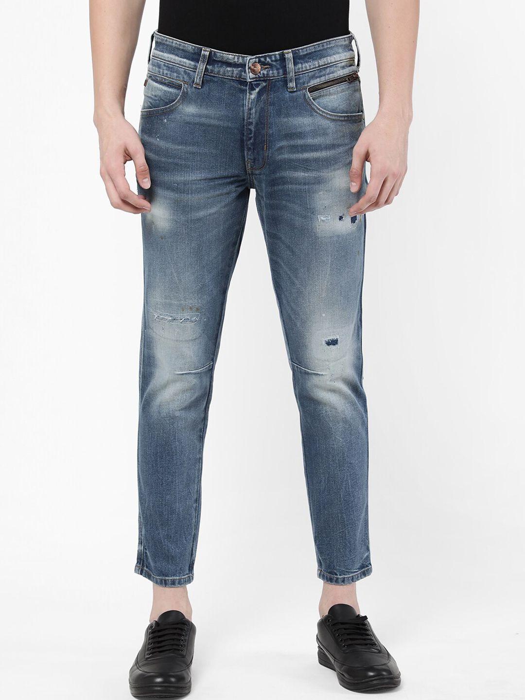 wrangler men blue slim fit mildly distressed heavy fade stretchable denim jeans