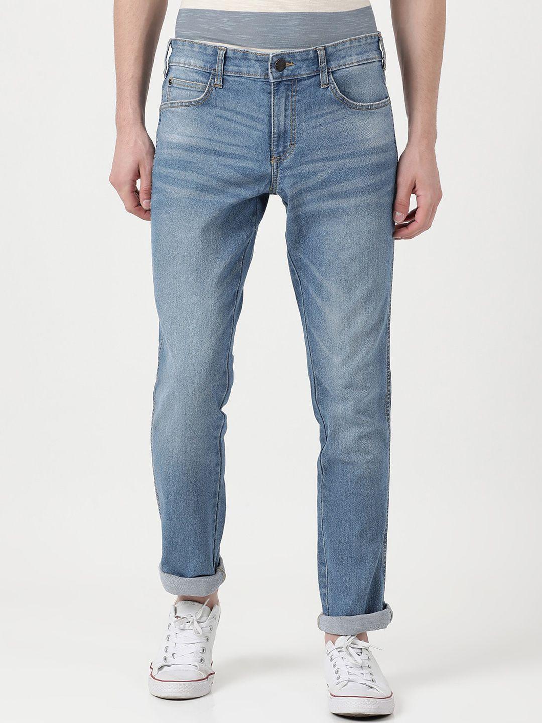 wrangler men blue skanders slim fit low-rise heavy fade stretchable jeans