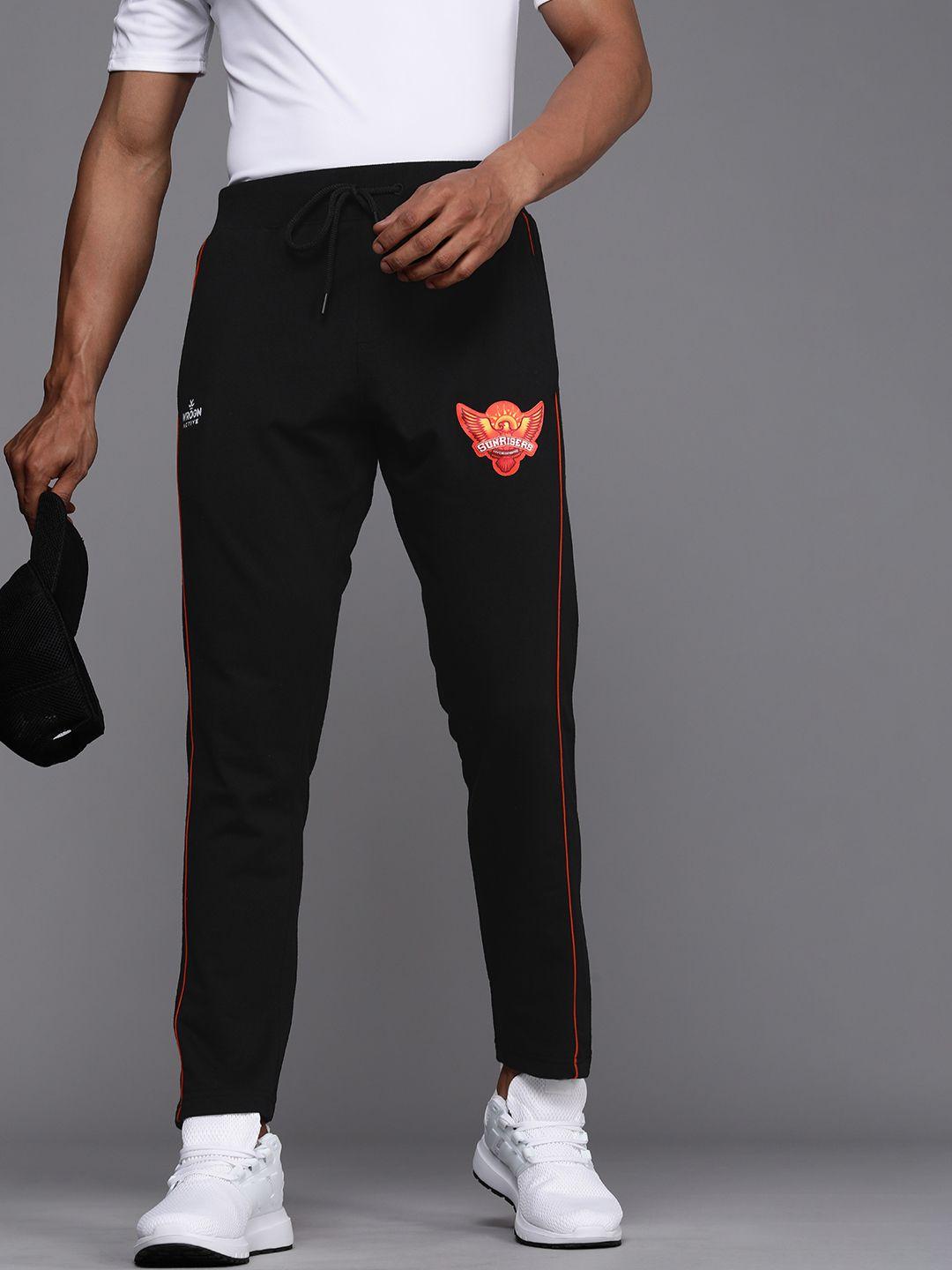 wrogn active men black & orange embroidered slim fit mid rise track pants