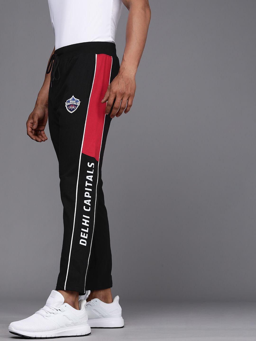 wrogn active men black & red colourblocked slim fit track pant with printed sides