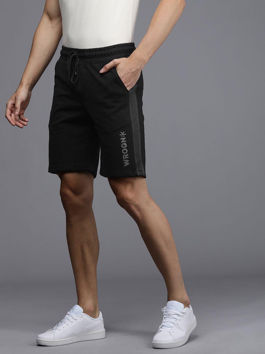 wrogn men black solid slim fit shorts mid-rise regular shorts with side taping