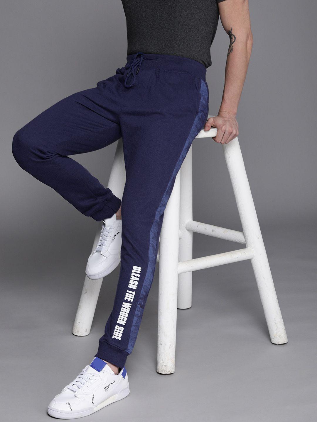 wrogn men navy blue printed detail slim fit joggers with side print