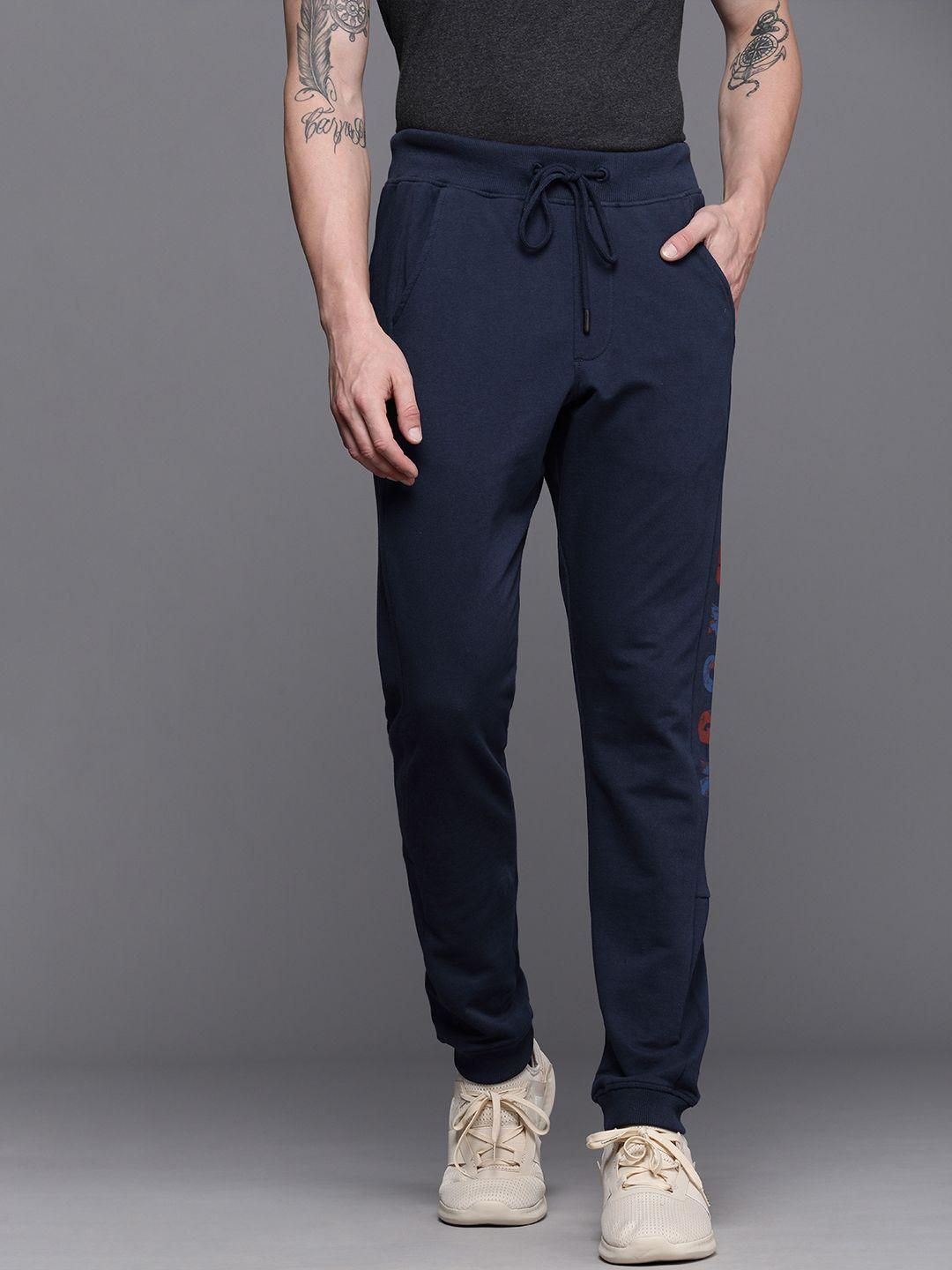 wrogn men navy blue slim fit brand logo printed joggers