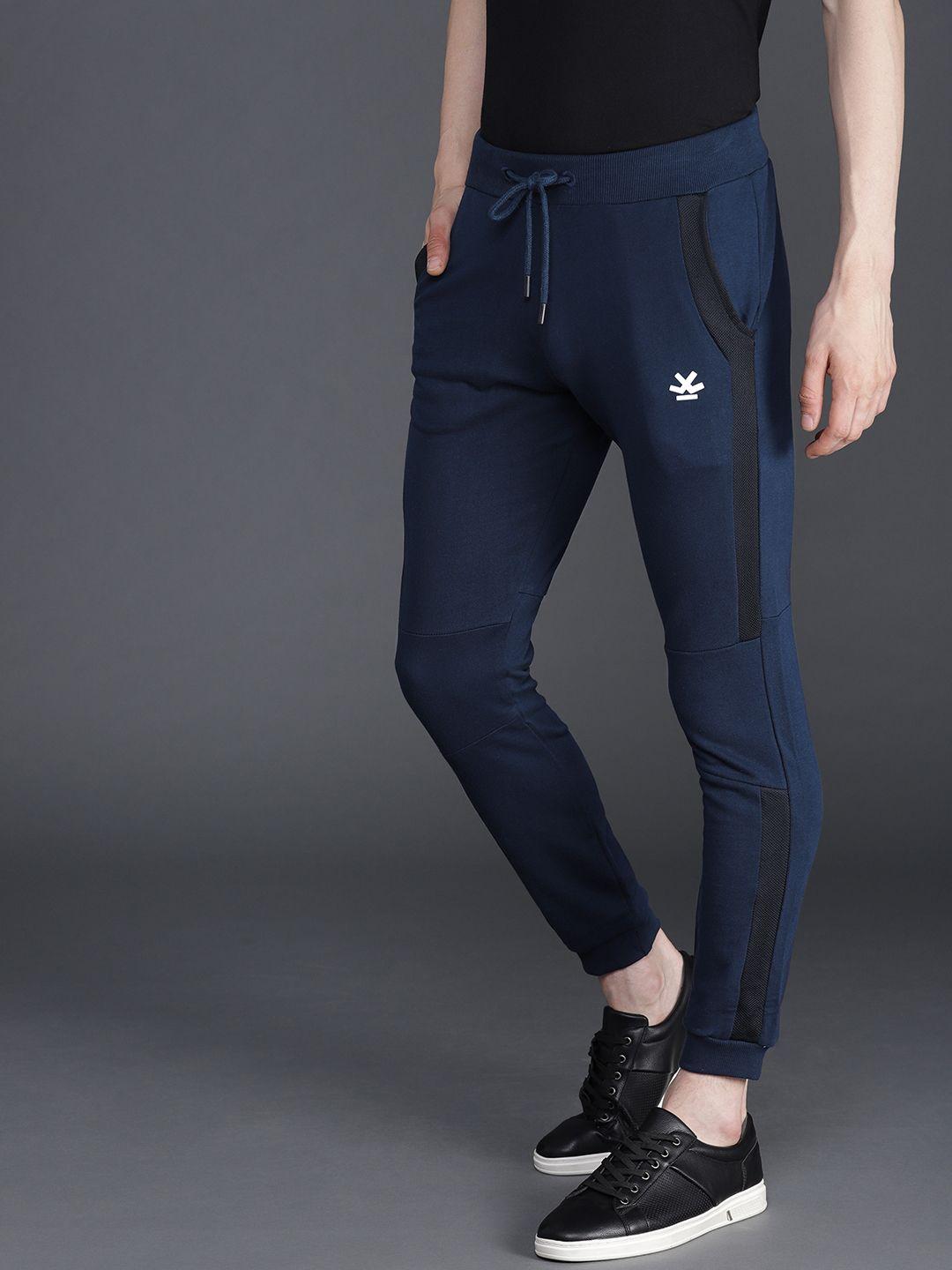 wrogn men navy blue slim fit solid joggers