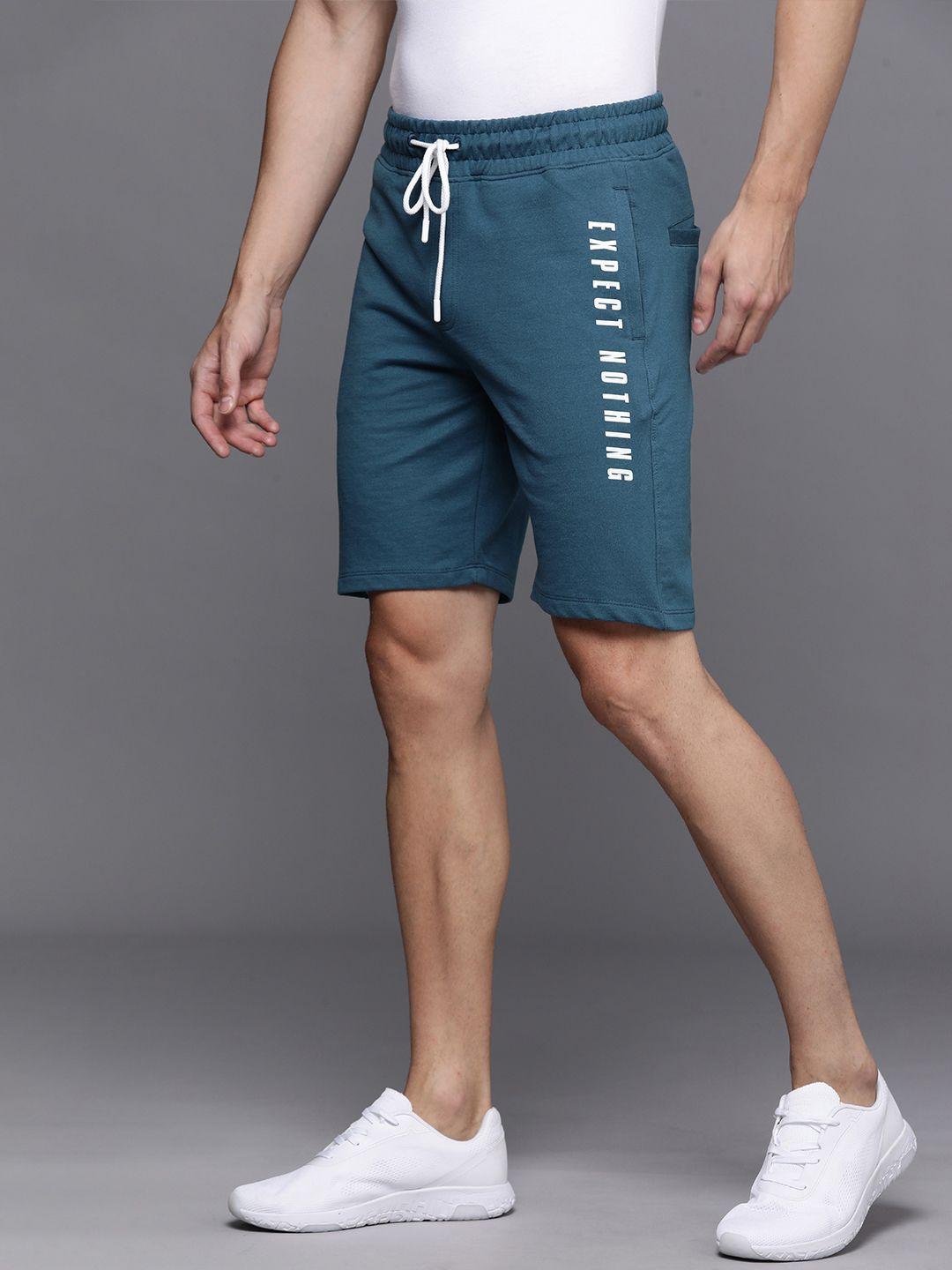 wrogn men teal blue typography printed mid-rise regular shorts