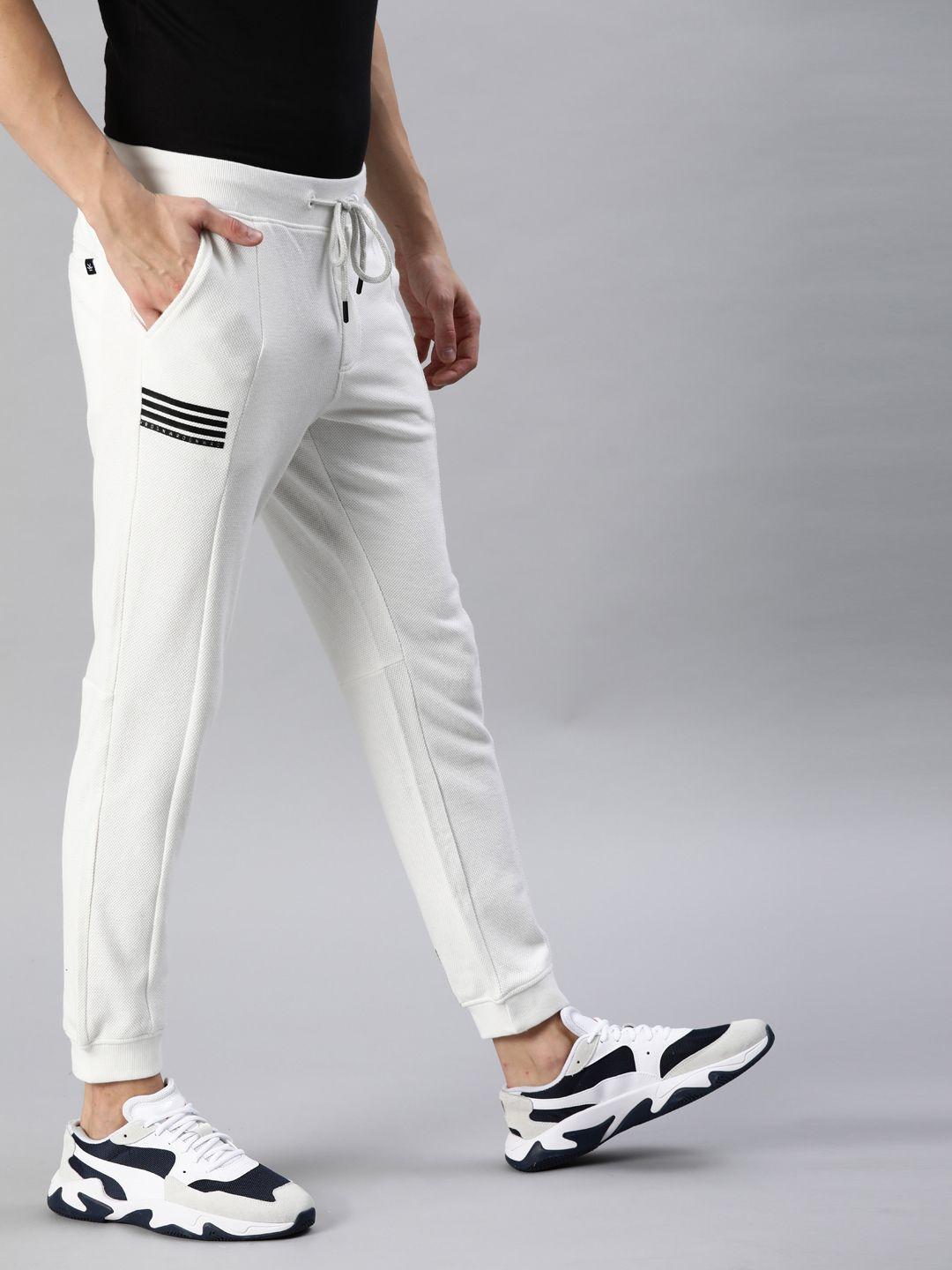 wrogn men white solid slim fit joggers with printed detailing