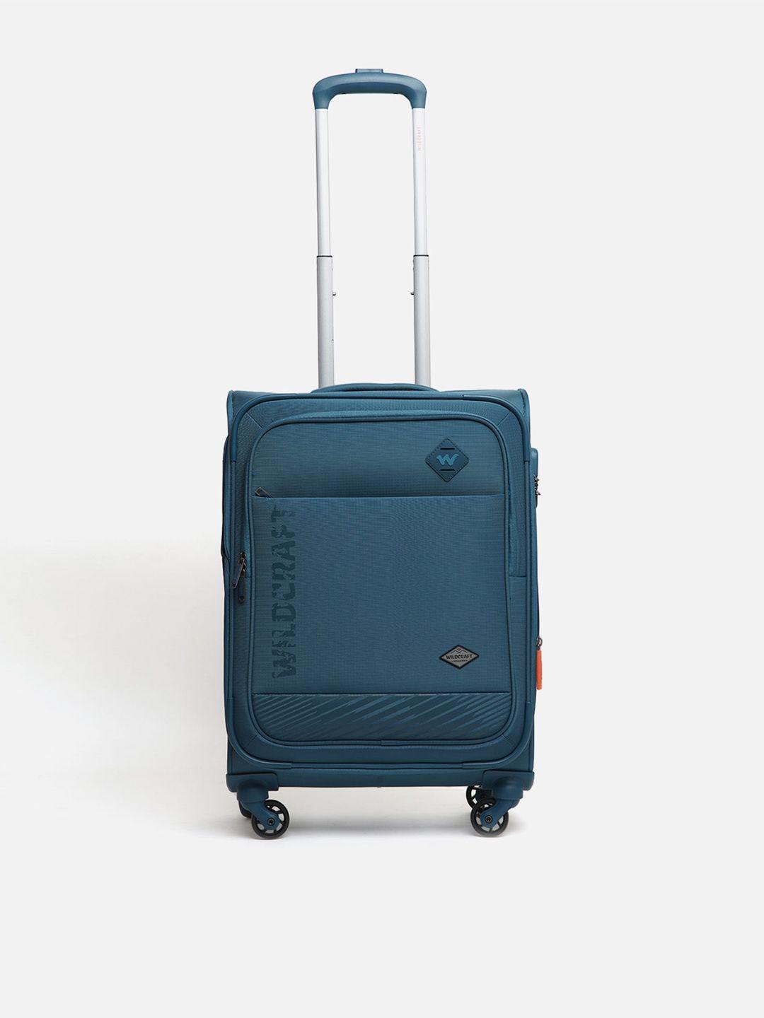 x teal blue solid travel trolley bag