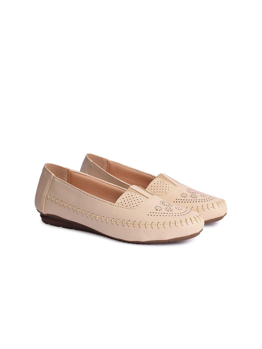xe looks women cream-coloured ballerinas with laser cuts flats