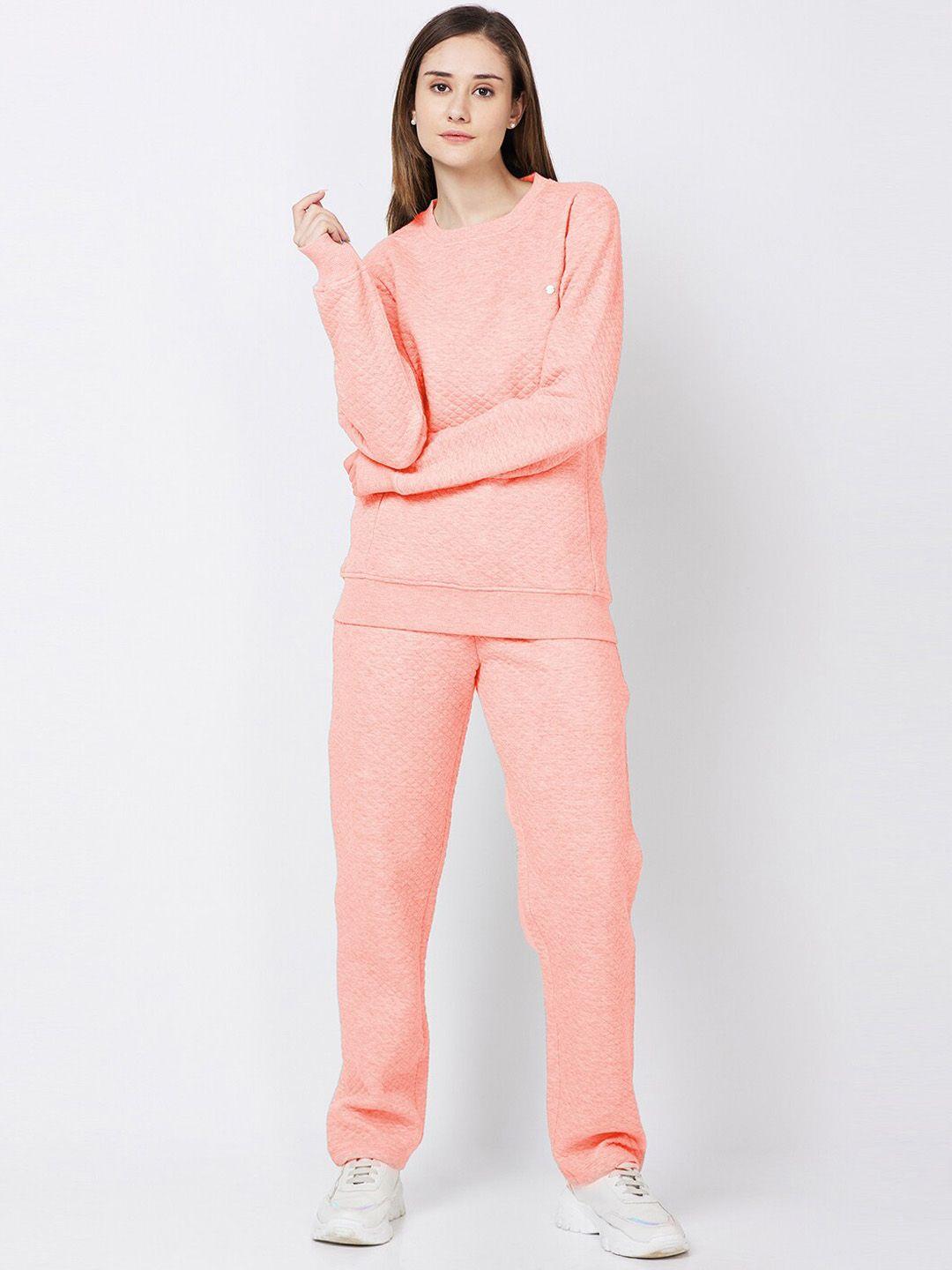 xin peach coloured quilted velour tracksuits