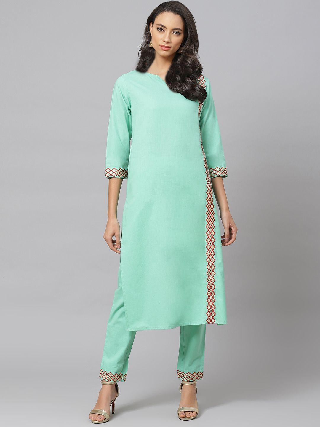 yash gallery women green solid kurta with trousers