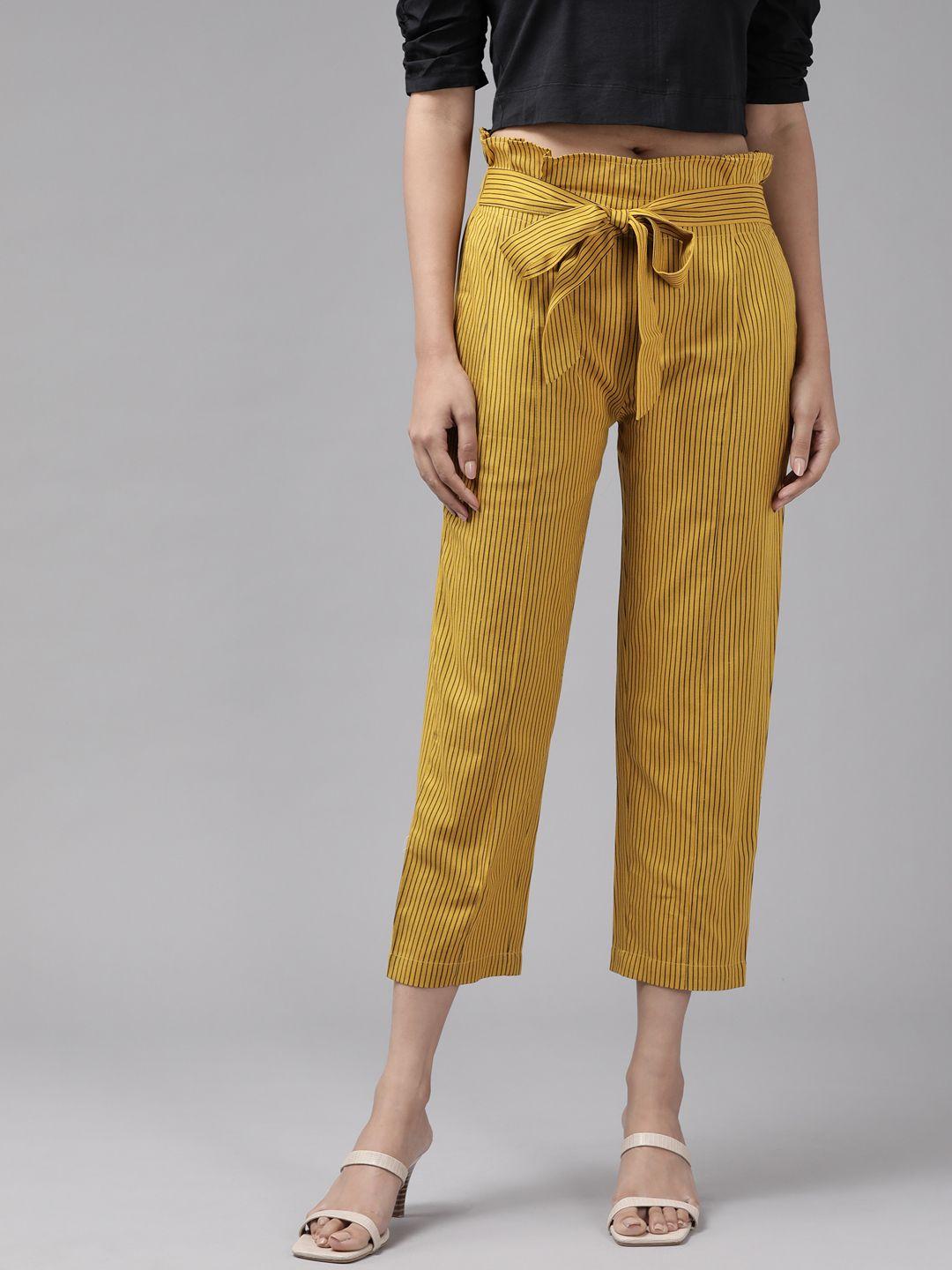 yash gallery women mustard yellow & black striped pleated peg trousers