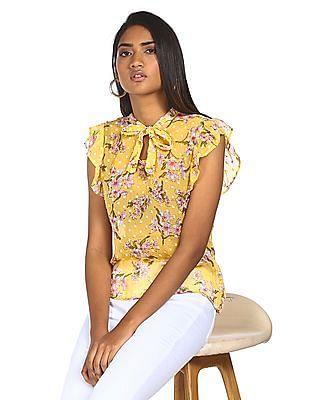 yellow sleeveless printed top