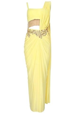 yellow and gold floral embroidered drape saree with starppy fringes blouse