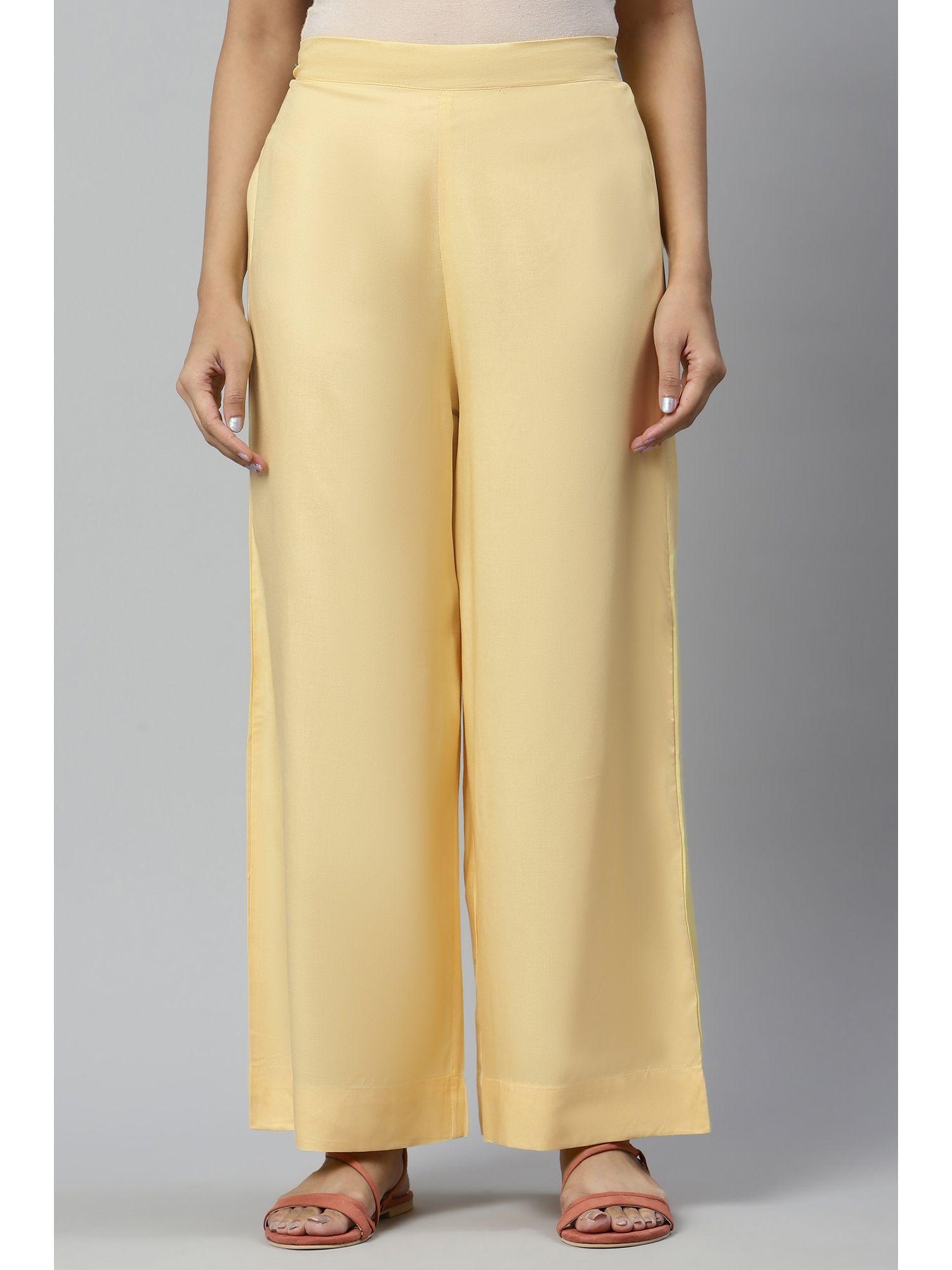 yellow ankle length flared solid liva eco palazzos