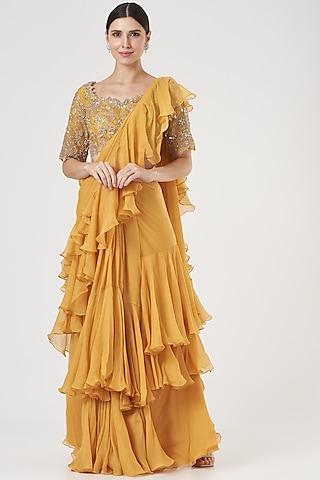 yellow chiffon ruffled saree