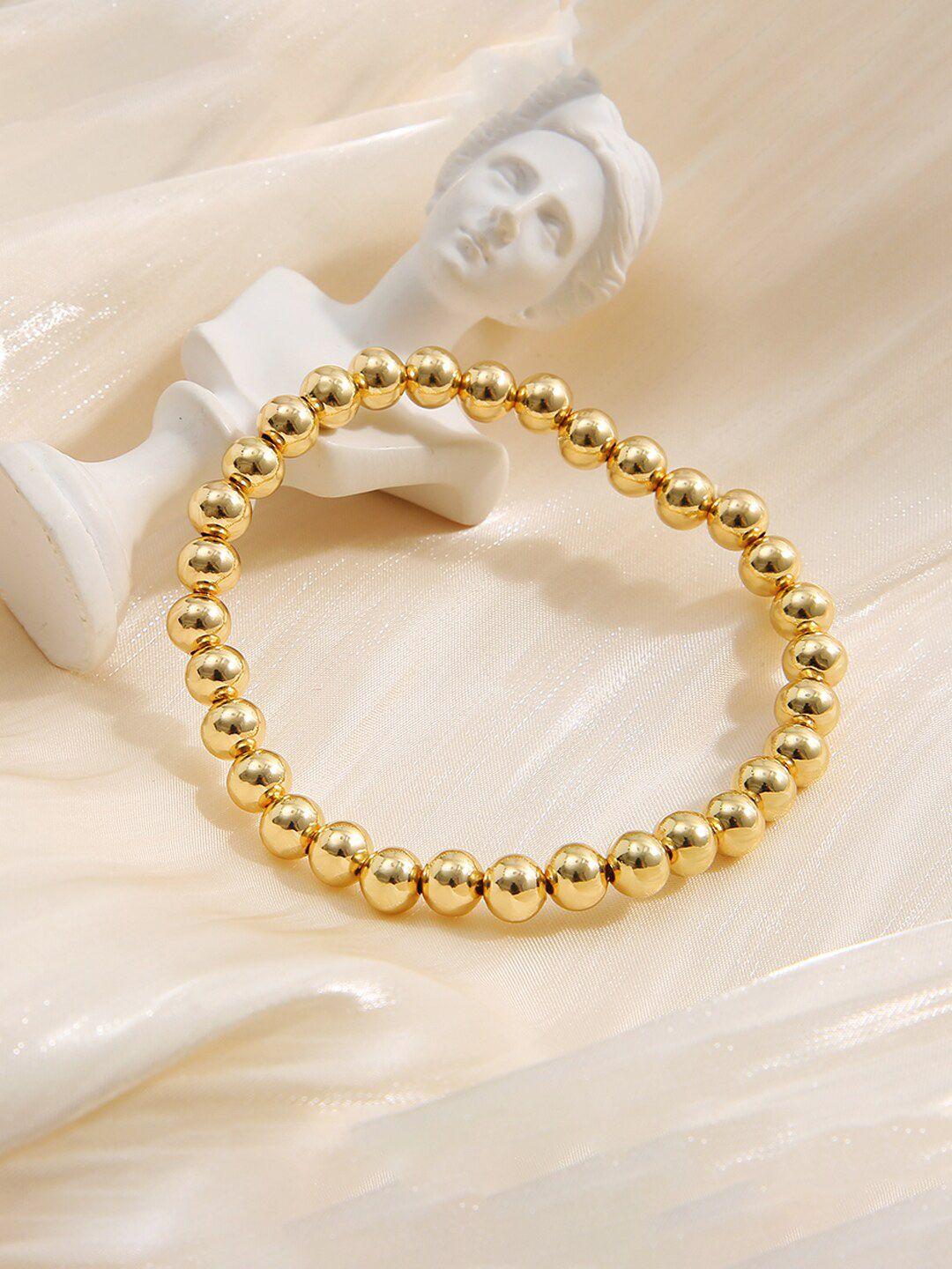 yellow chimes women gold tone beads studded bracelet