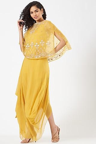 yellow draped dress with organza cape