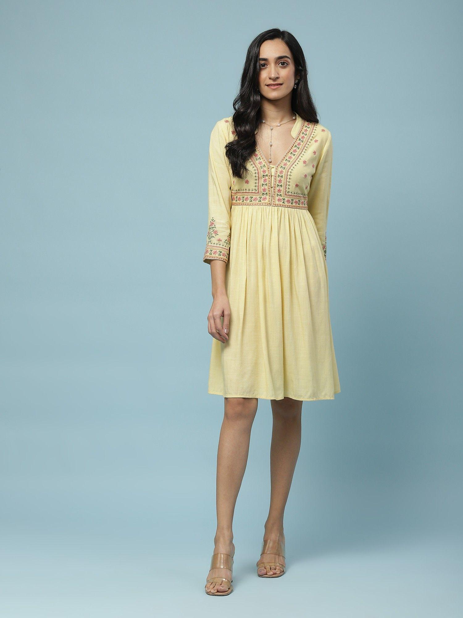 yellow embroidered dress