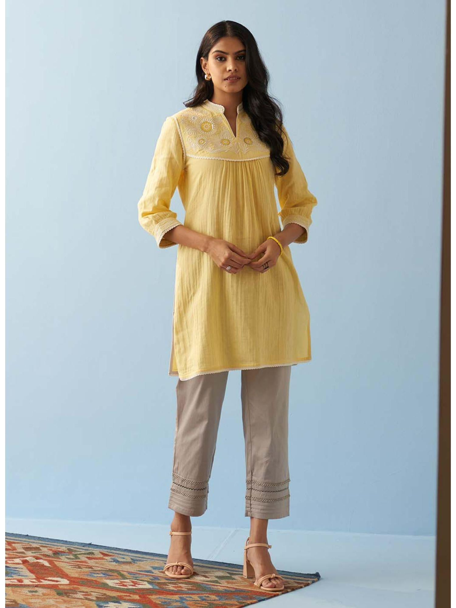 yellow embroidered thigh length crinkled kurti