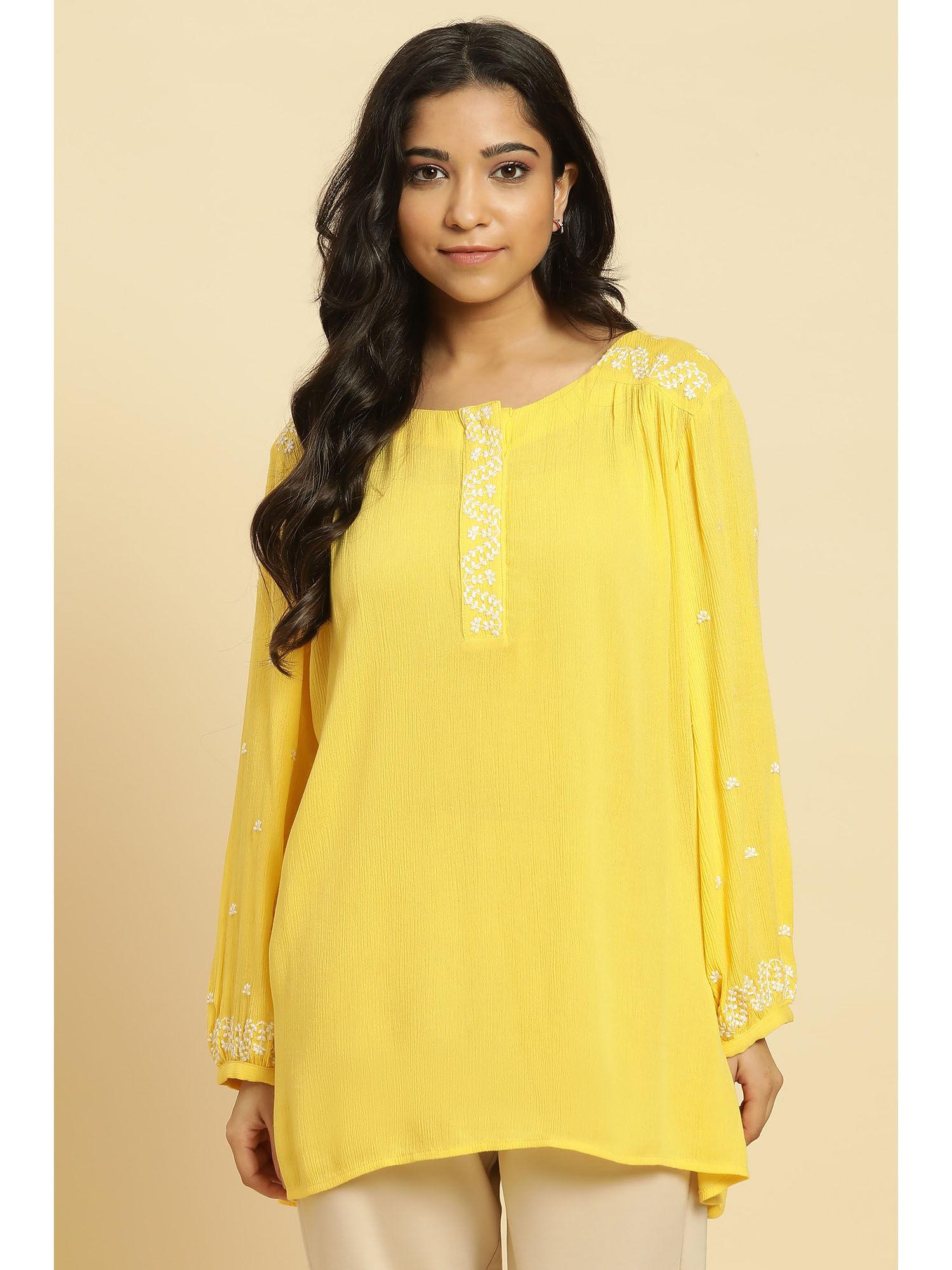 yellow embroidered top