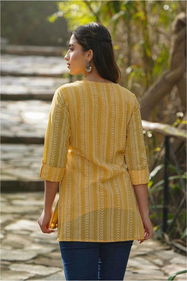 yellow ethnic motif printed georgette high-low tunic.