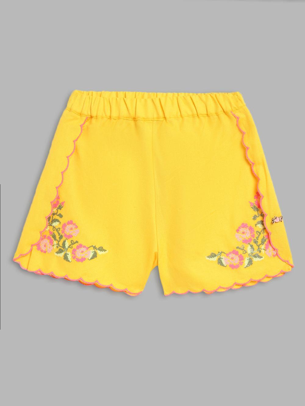 yellow flared embroidered shorts