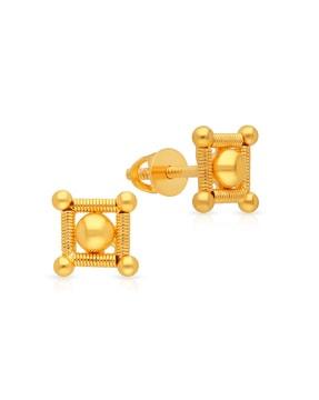 yellow gold stud earrings