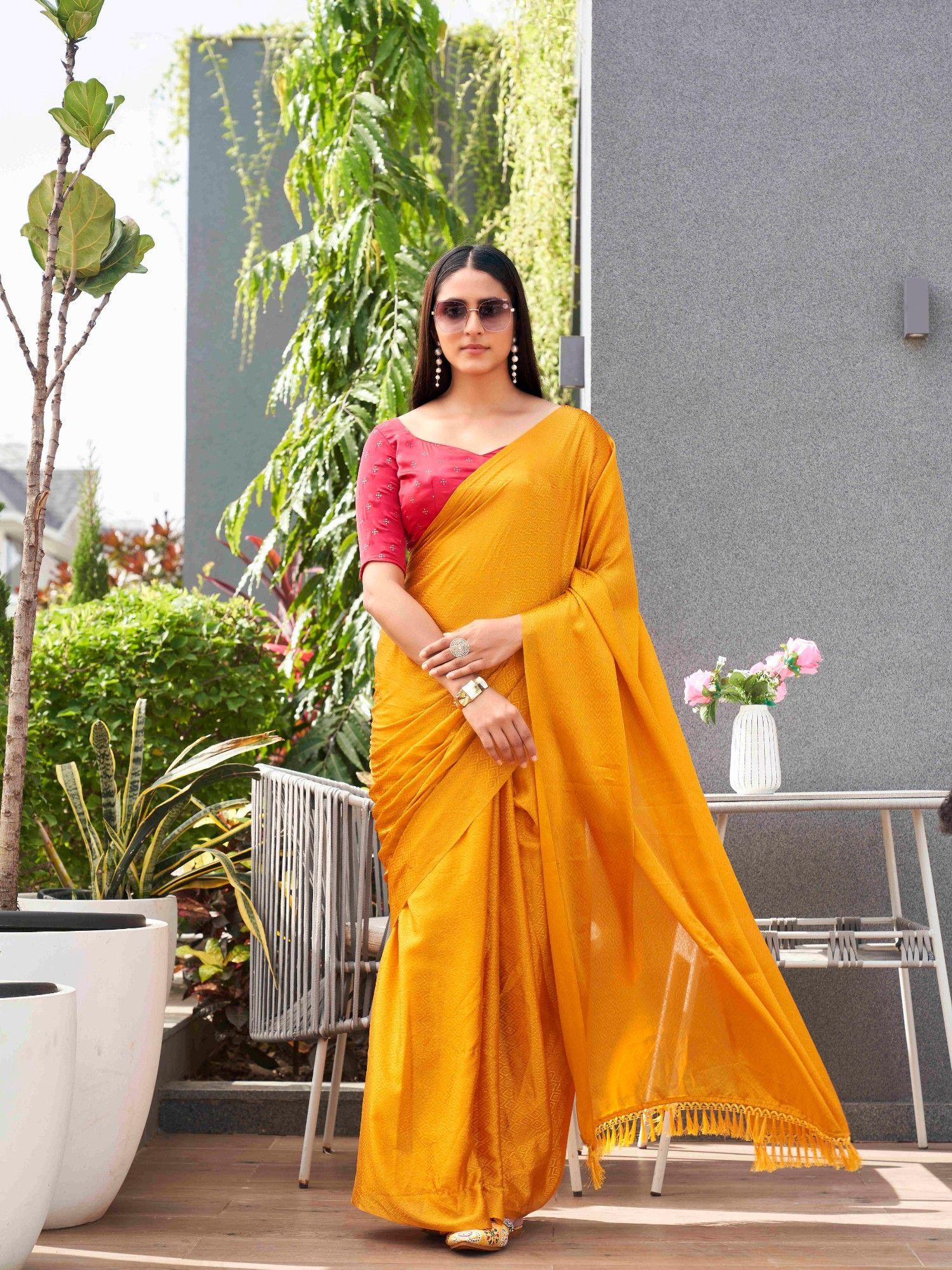 yellow jacquard saree with embellished unstitched blouse