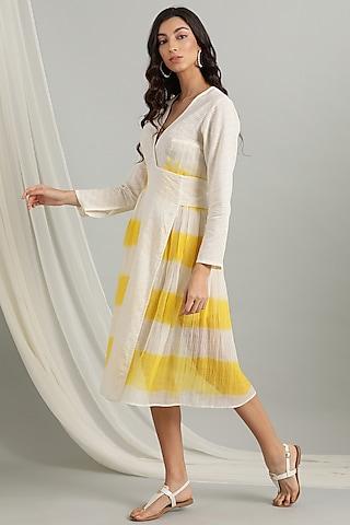 yellow knee length pleated dress