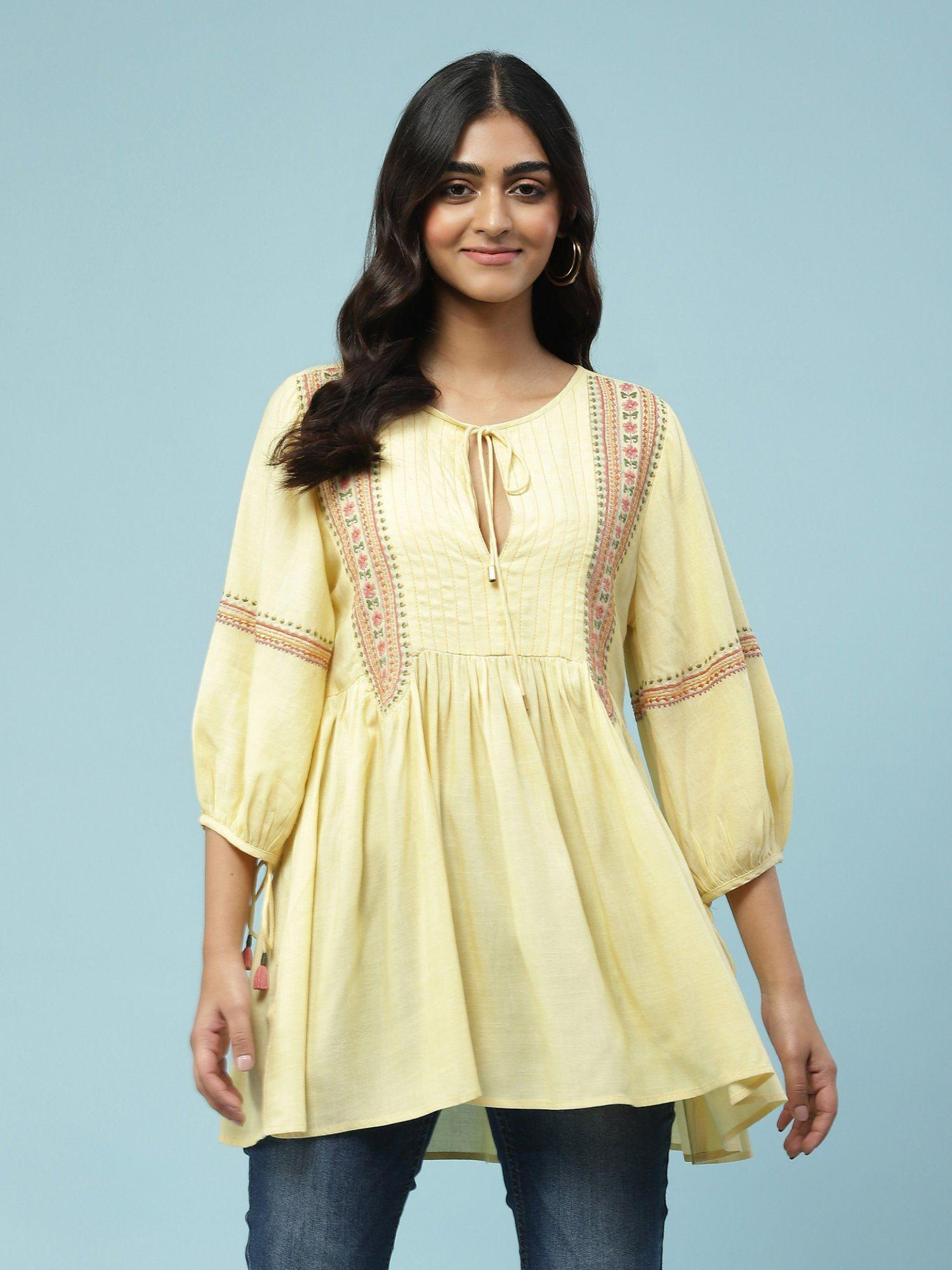 yellow kurti with thread embroidery