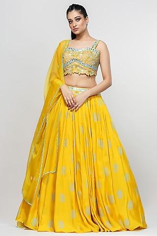 yellow lehenga set with mirror work