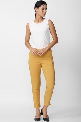 yellow ochre solid ankle-length casual women slim fit trousers