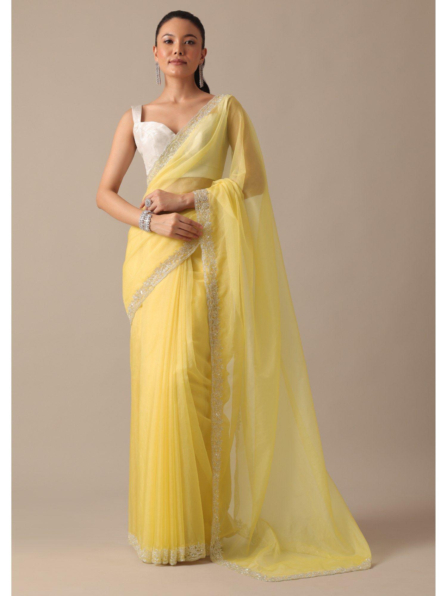 yellow organza saree with scallop border with unstitched blouse