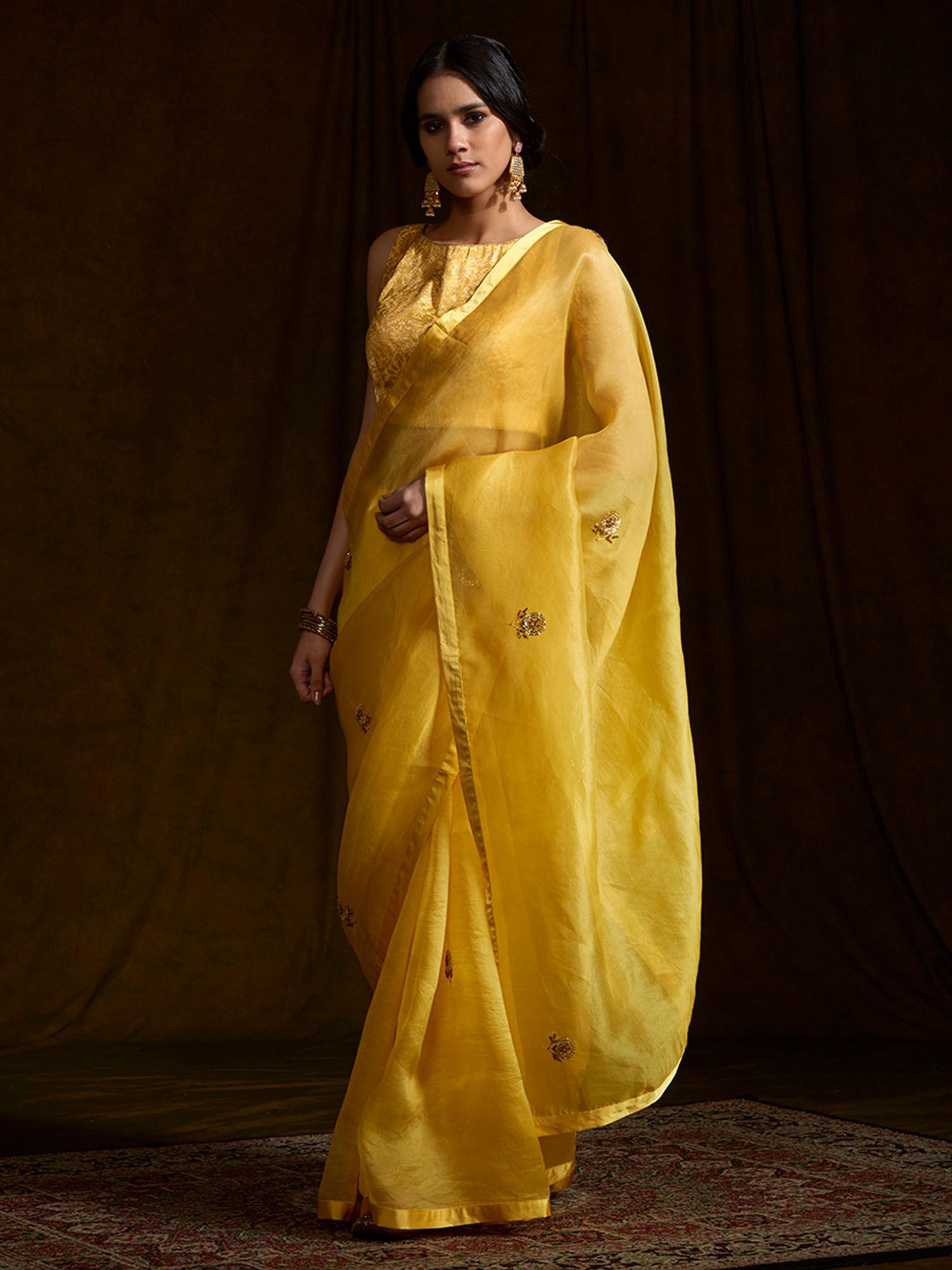 yellow organza saree with unstitched blouse