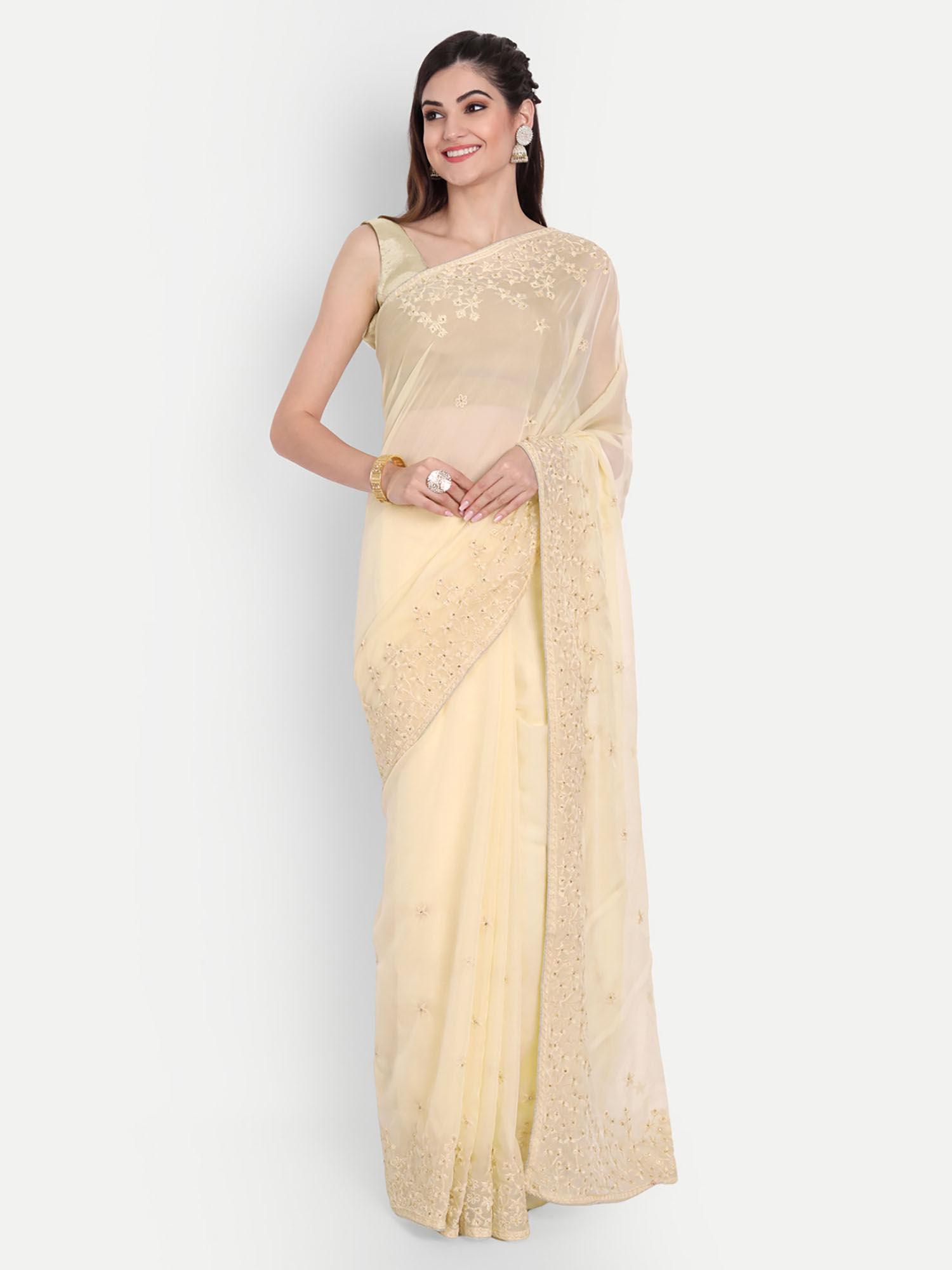 yellow organza self thread embroidered saree with unstitched blouse