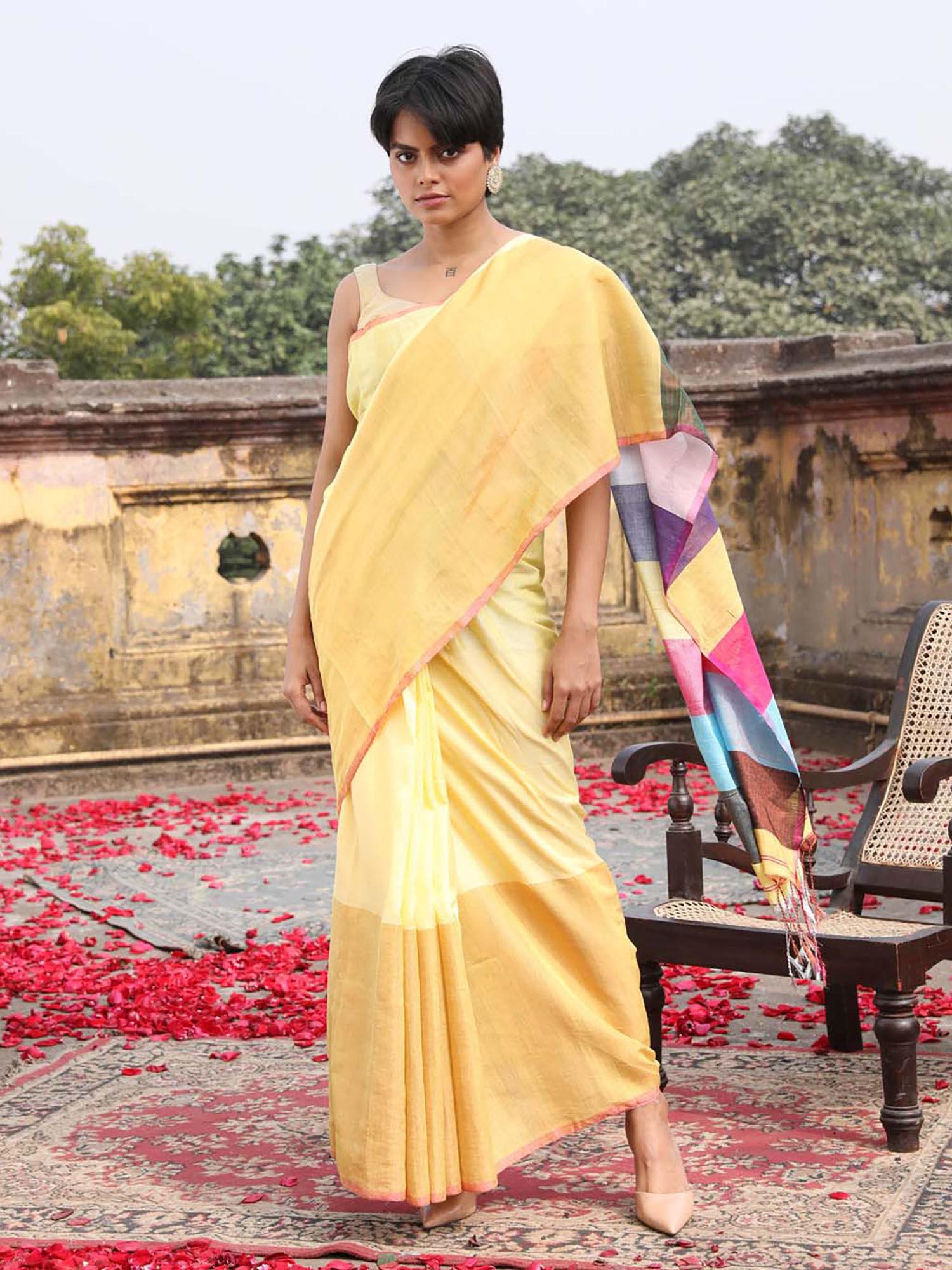 yellow party wear saree with unstitched blouse