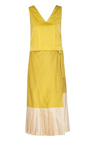 yellow pleated top with wrap skirt