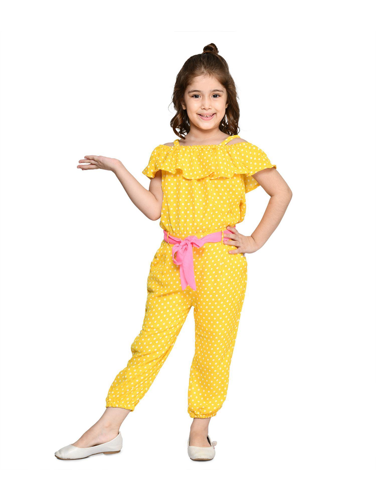 yellow polka jumpsuit with neon belt