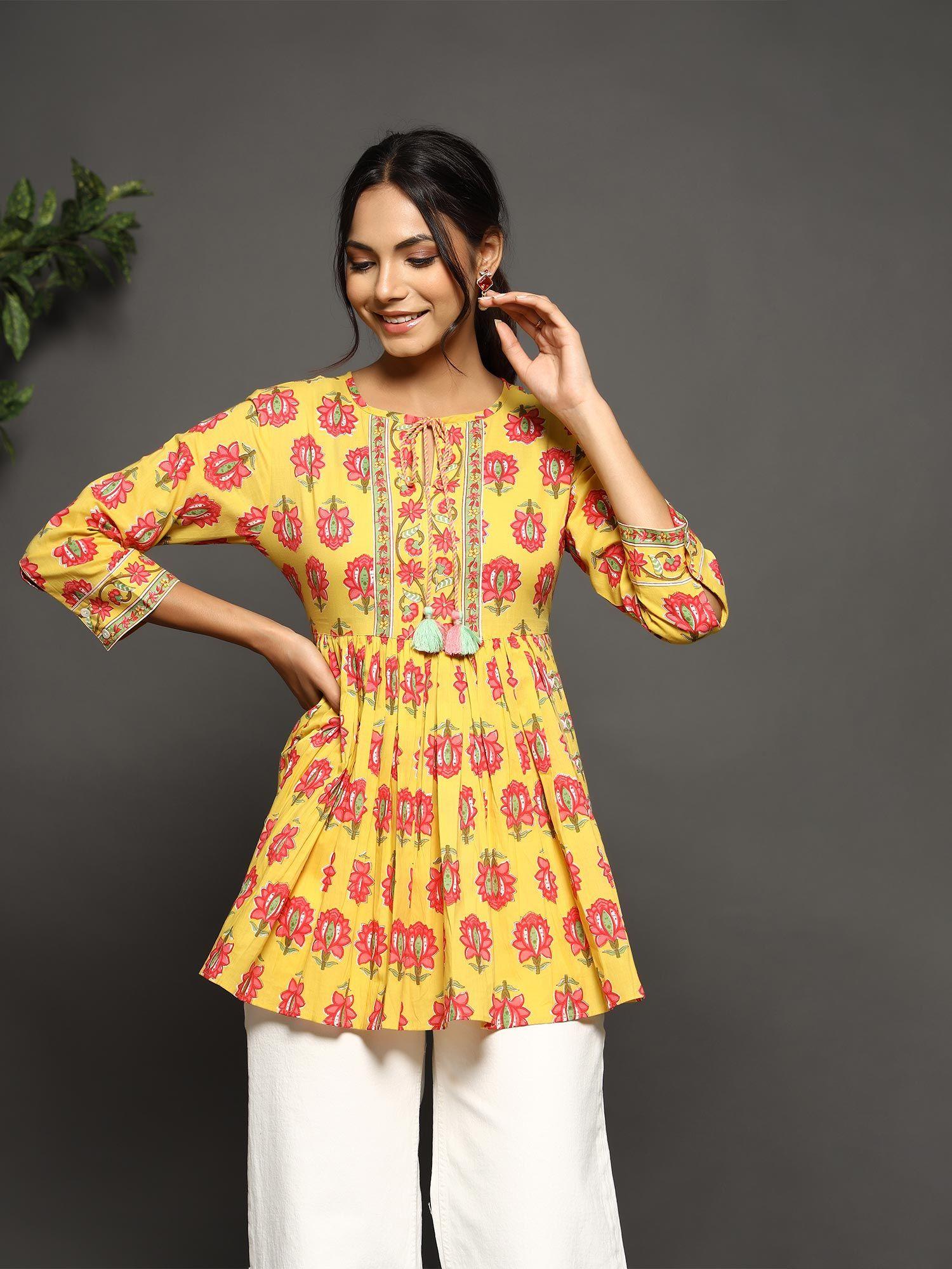 yellow printed kurti with gathers and tie up detail