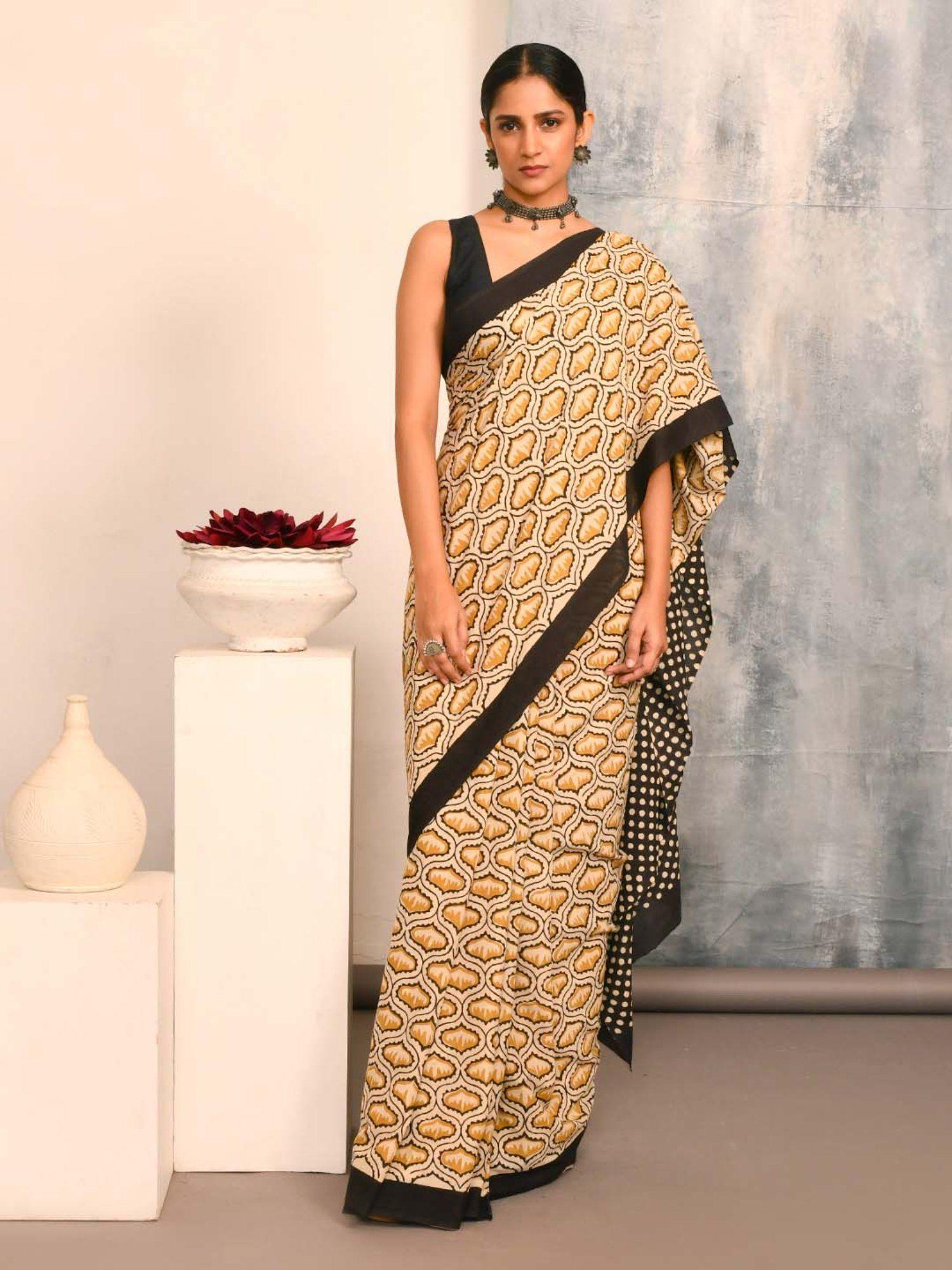 yellow printed saree with unstitched blouse