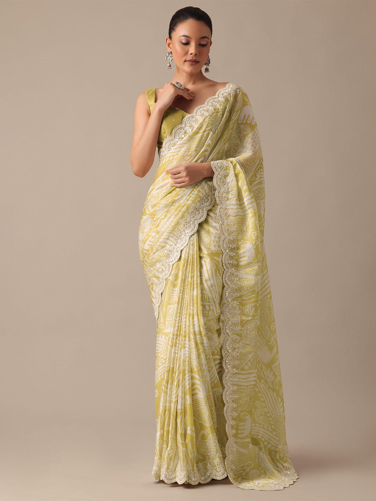 yellow printed satin embroidered saree with unstitched blouse