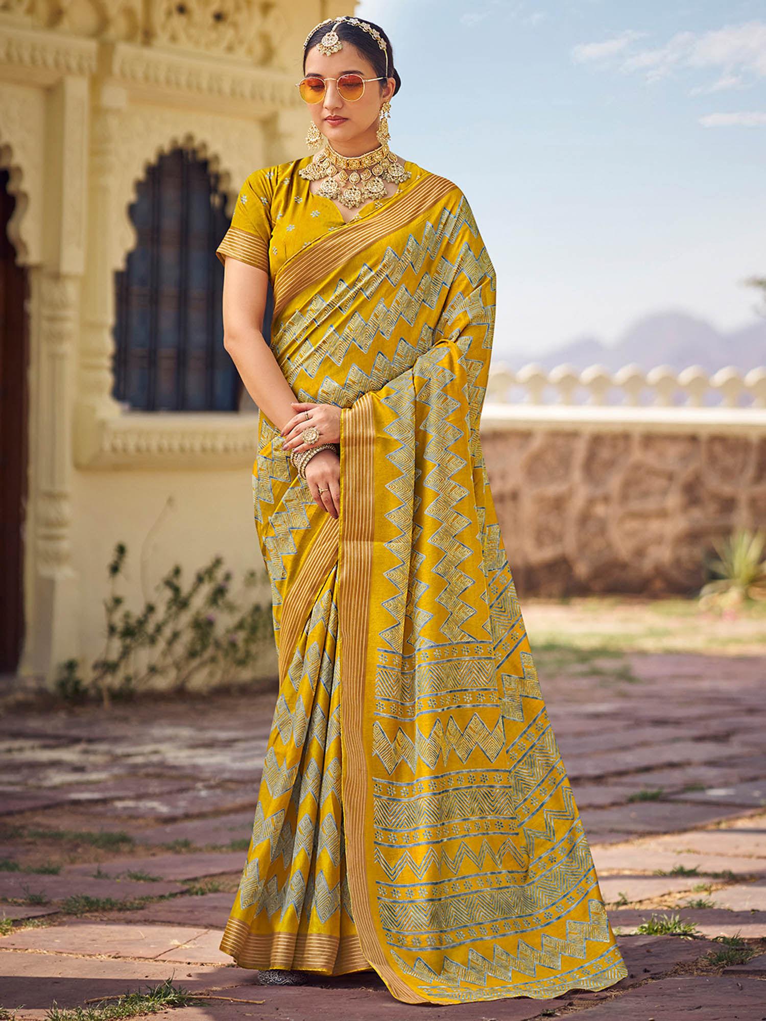 yellow silk cotton batik print saree with unstitched blouse