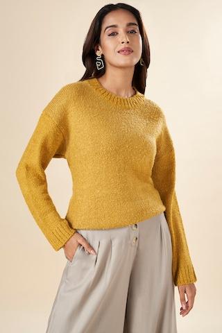 yellow solid winterwear full sleeves round neck women regular fit  sweater