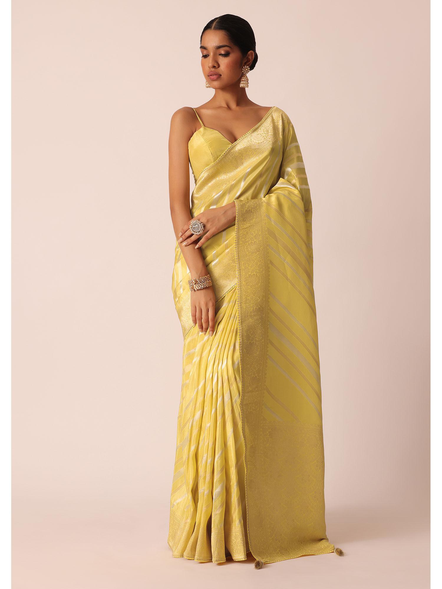 yellow striped tissue silk saree with unstitched blouse