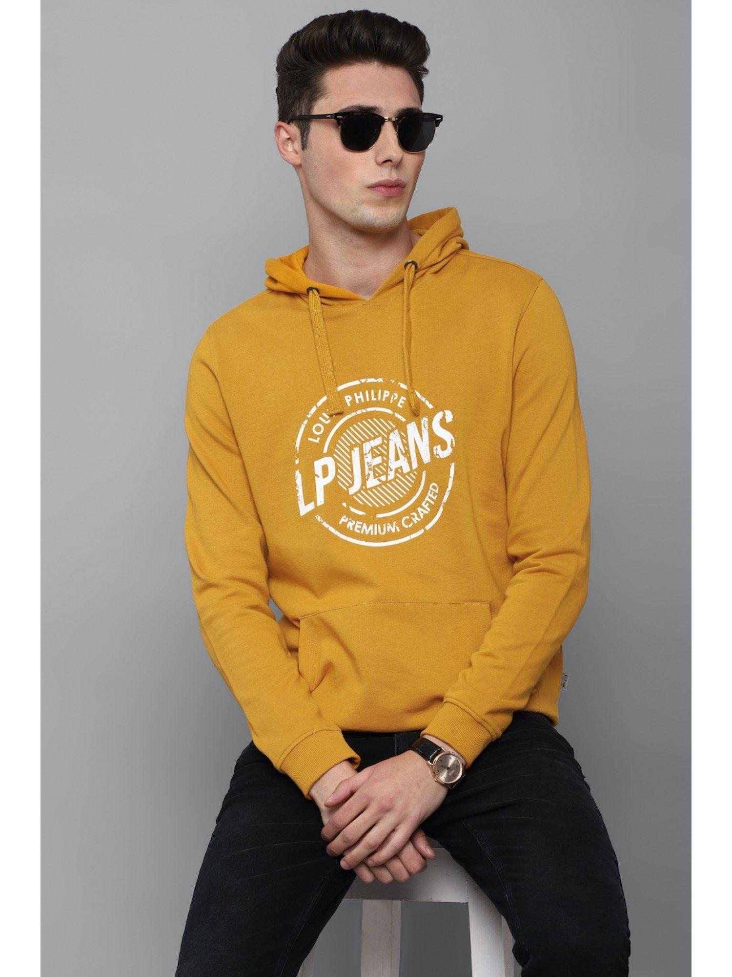 yellow sweatshirt